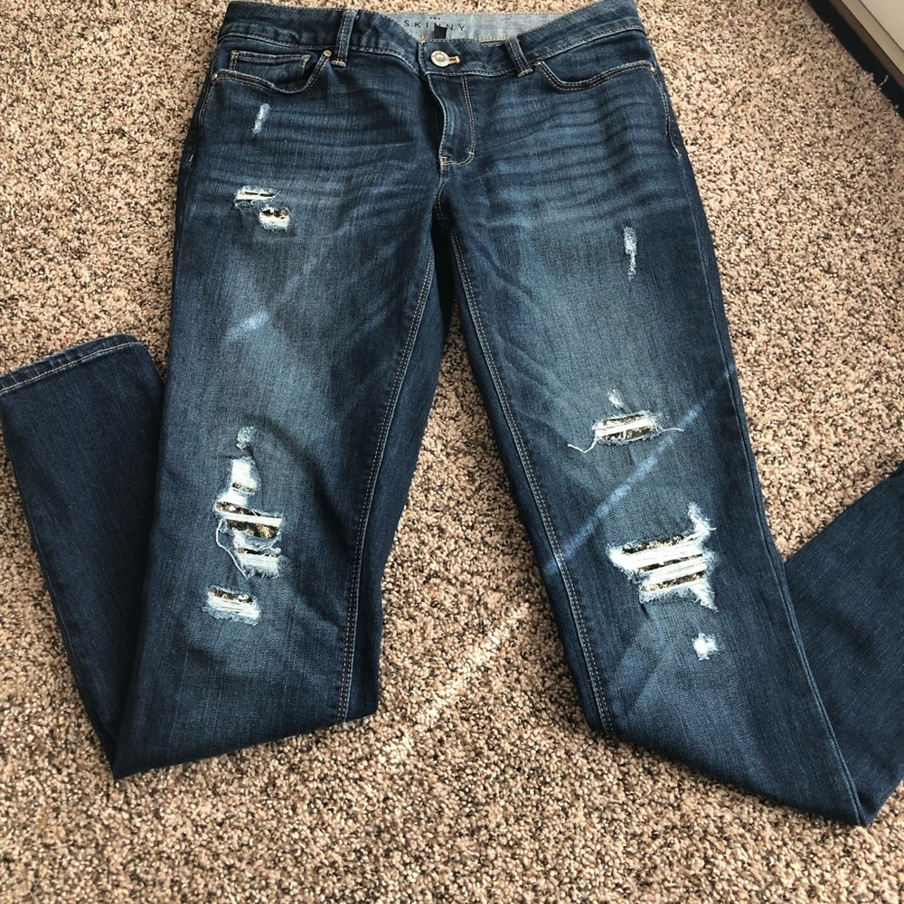 Distressed jeans with sequins. Great party jeans!